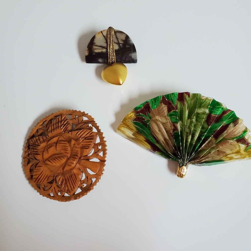 Trio of brooches